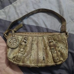 A snakeskin Jessica Simpson purse